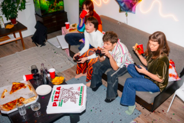 friends eating pizza, house party