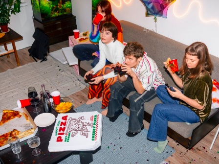 friends eating pizza, house party